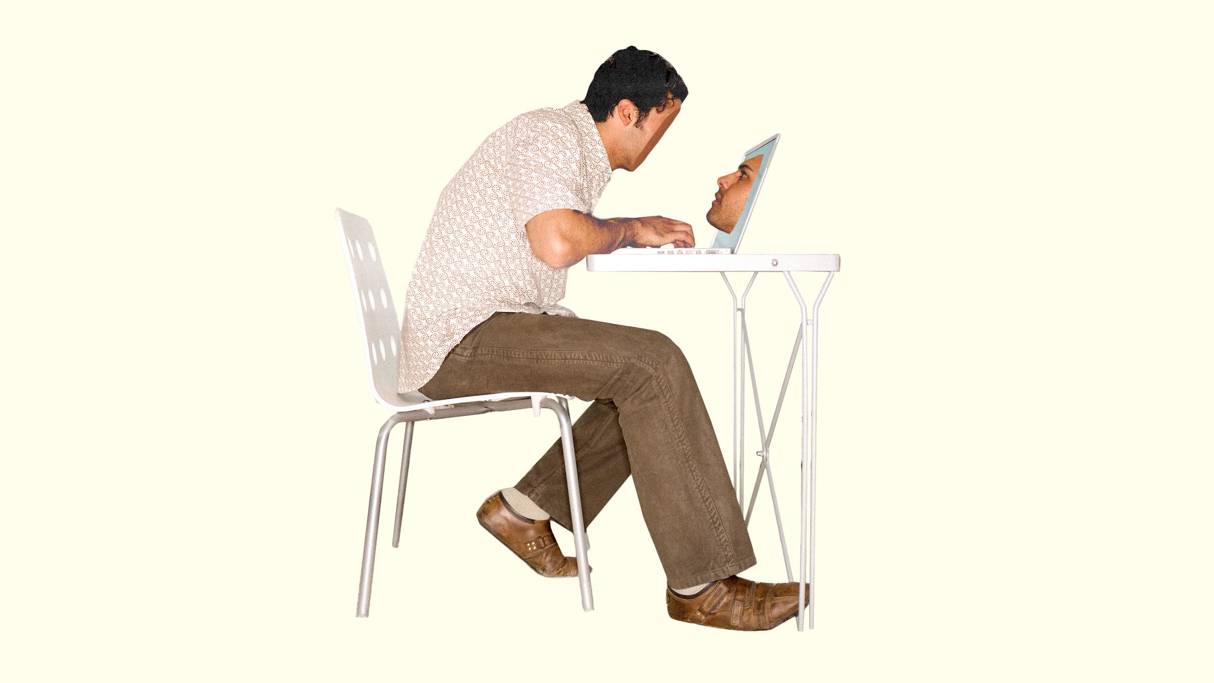 Um homem sem rosto se inclinou sobre um laptop com o rosto dentro.